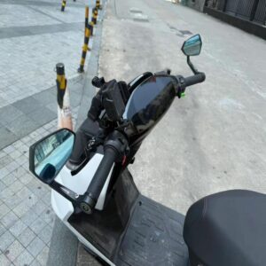 CNC aluminum brake lever for Segway E200P Niu ZEEHO electric moped installed on handlebar showing direct bolt-on fitment and angle view